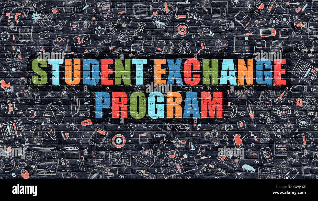 Multicolor Student Exchange Program auf dunklen Brickwall. Stockfoto