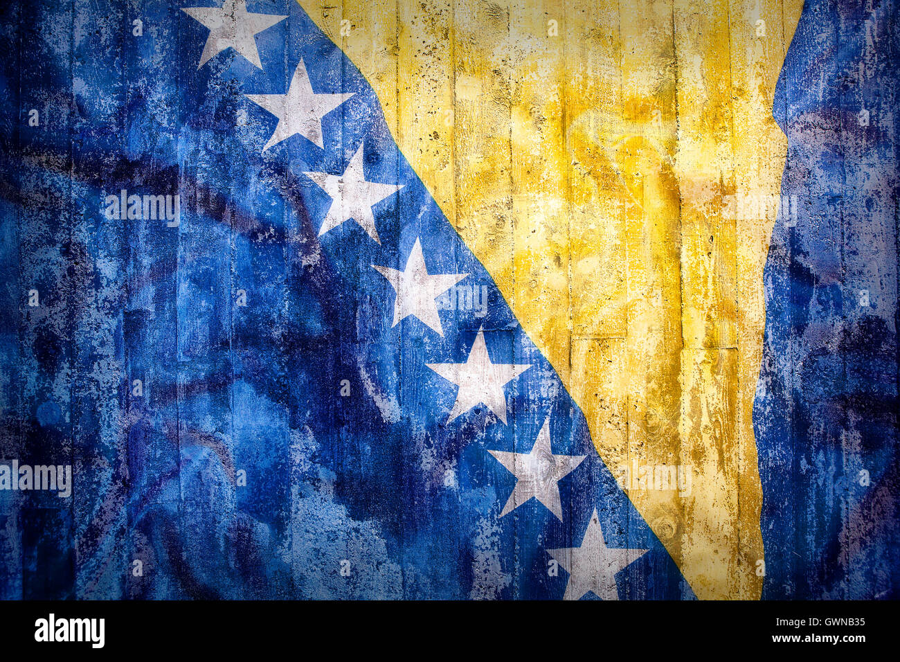 Grunge-Stil von Bosnien und Herzegowina Fahne auf eine Mauer für Hintergrund Stockfoto