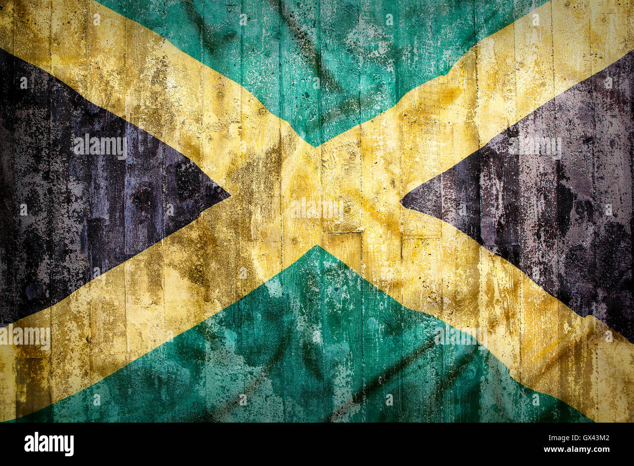 Grunge-Stil der Jamaika-Flagge auf eine Mauer für Hintergrund Stockfoto