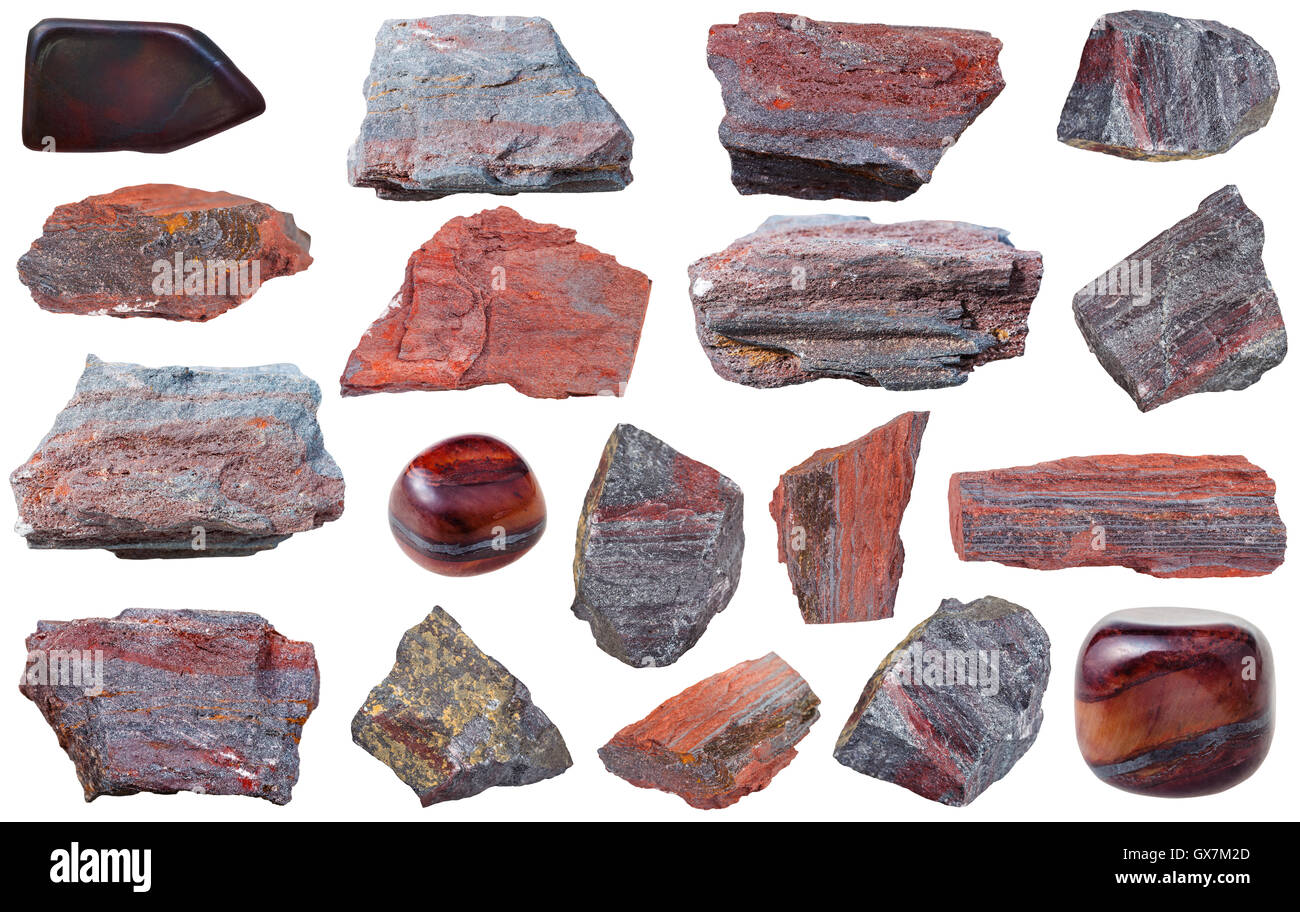 Sammlung von Roh- und Trommelsteine Exemplare von Jaspillite (Jaspilite, eisenhaltige Quarzit) Mineral isoliert auf weißem Hintergrund Stockfoto