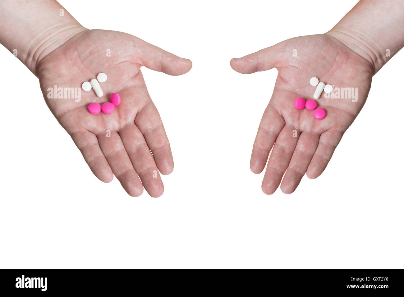 Gute und schlechte Drogen in offenen Handflächen auf dem weißen Hintergrund isoliert. Stockfoto