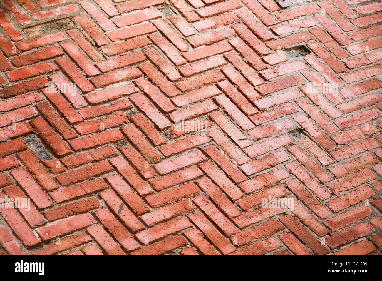 Alte rote Backstein gepflasterten Muster, Hintergrundtextur Foto Stockfoto
