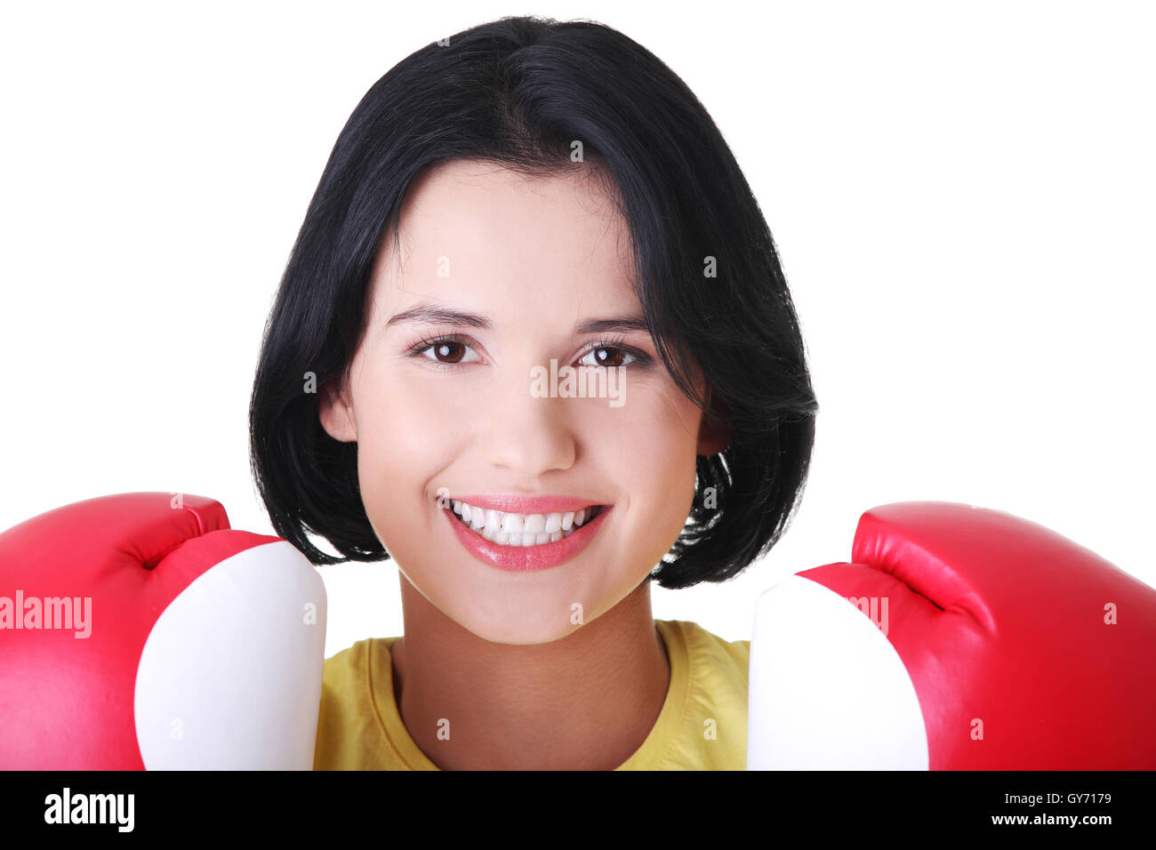 Attraktive junge Frau mit Boxhandschuhen. Stockfoto
