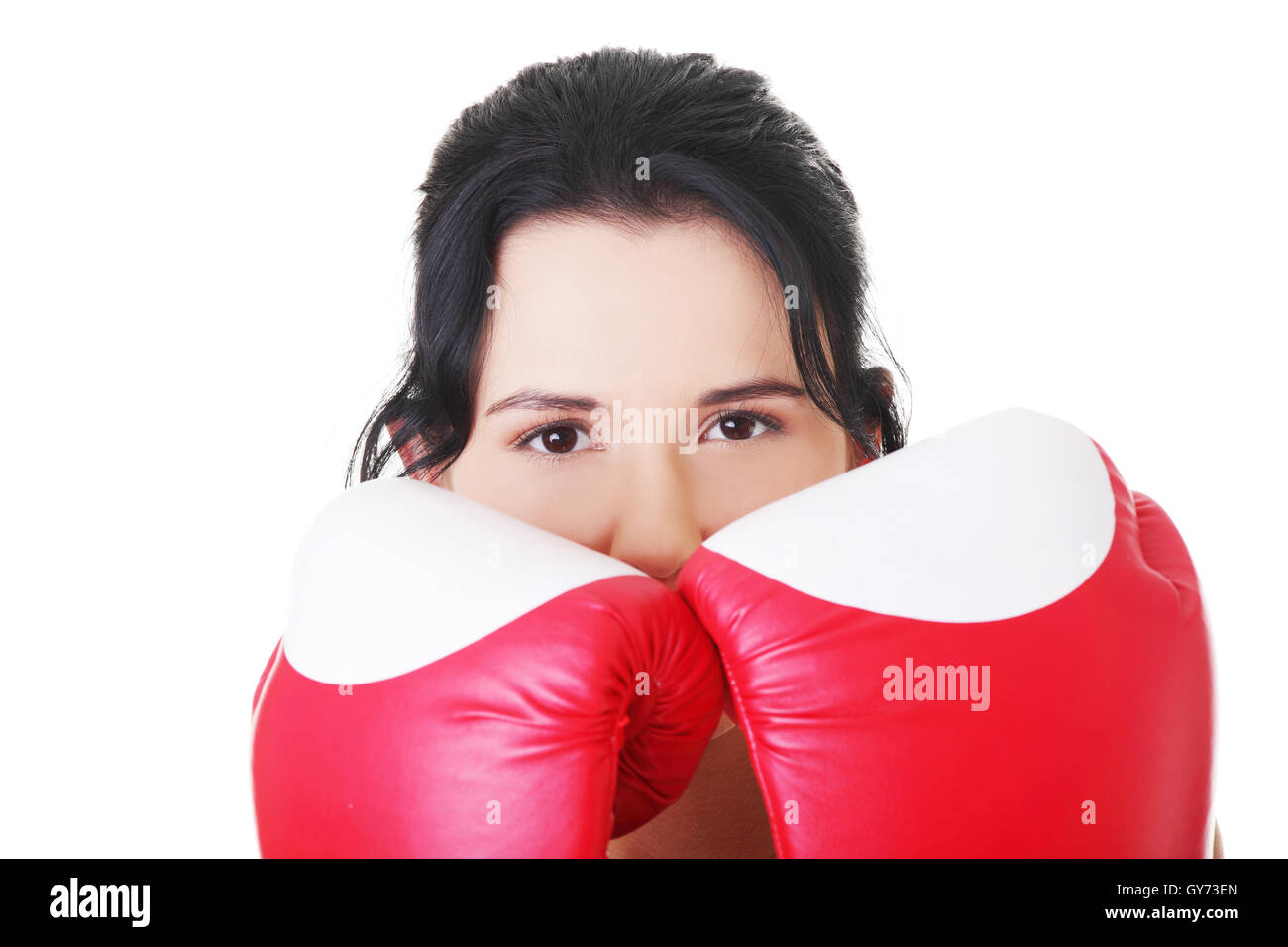 Attraktive junge Frau mit Boxhandschuhen. Closeup. Stockfoto