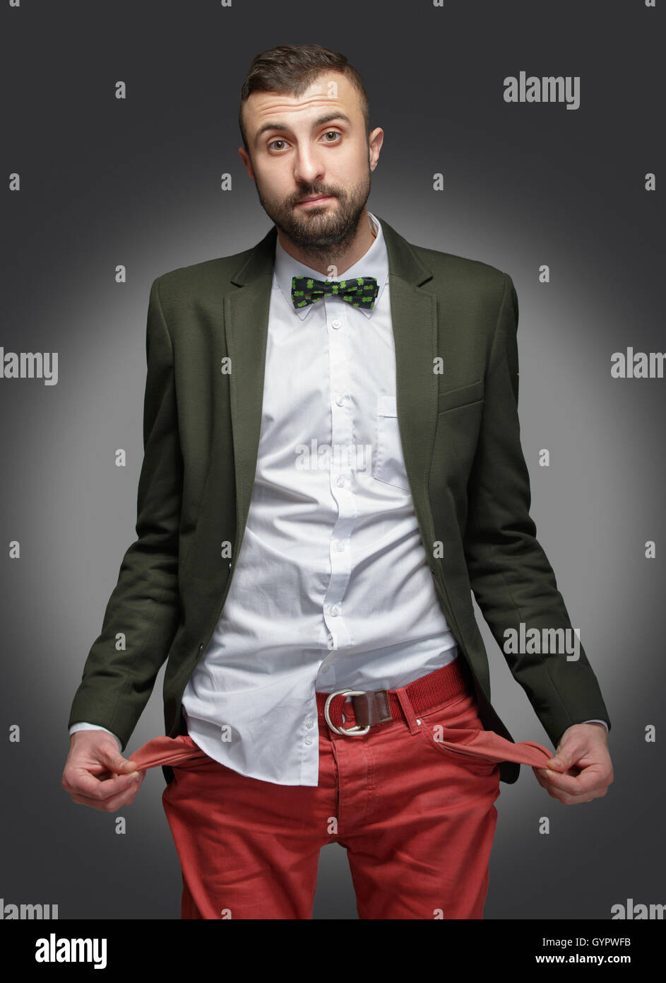 junger Mann in einem grünen Anzug, kein Geld Stockfotografie - Alamy
