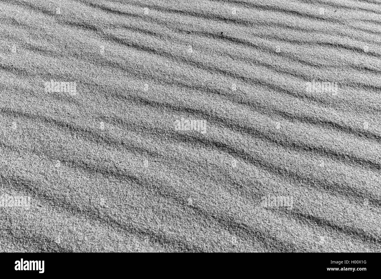 Strand Sand Oberflächenstruktur. Natürliche Hintergründe und Texturen Stockfoto