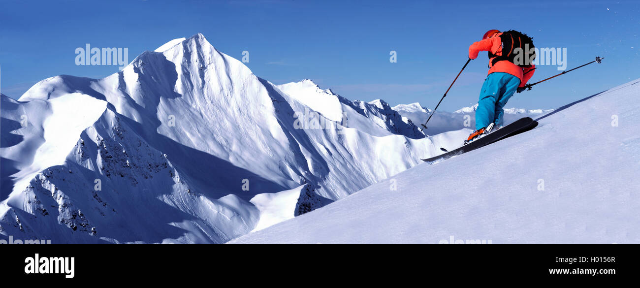 Skifahrer in den Alpen, den Mont Jovet im Hintergrund, Frankreich, Savoyen Stockfoto