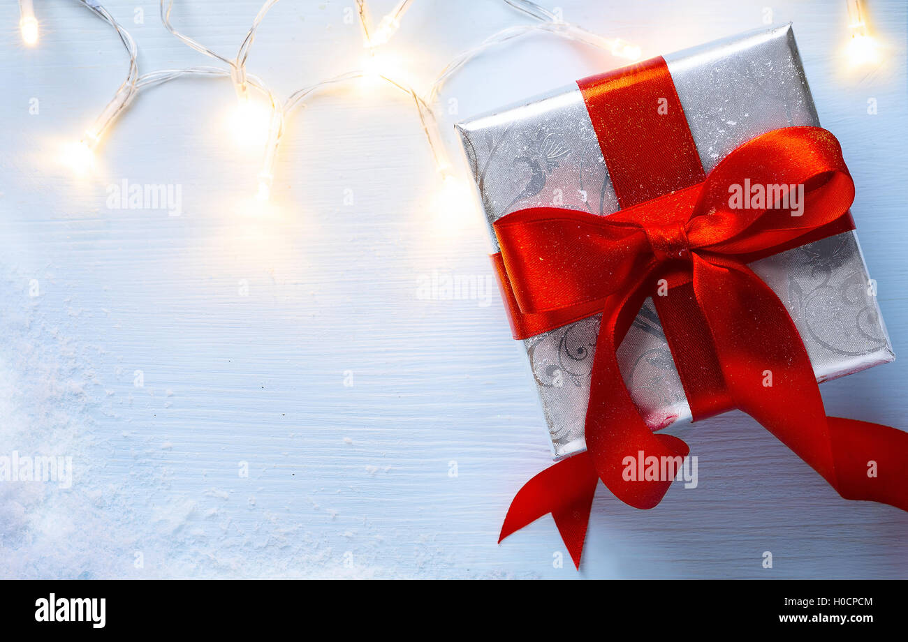 Festliche Weihnachten Hintergrund mit Geschenk-Box und Weihnachtslicht Stockfoto