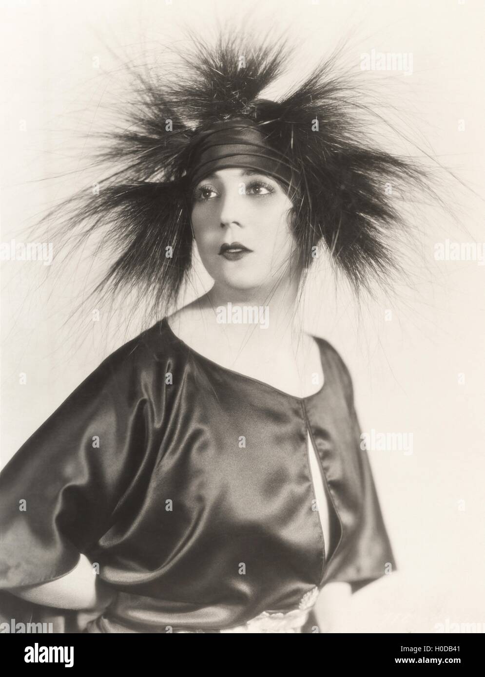 Eine weitere Feder in ihre Mütze Stockfoto