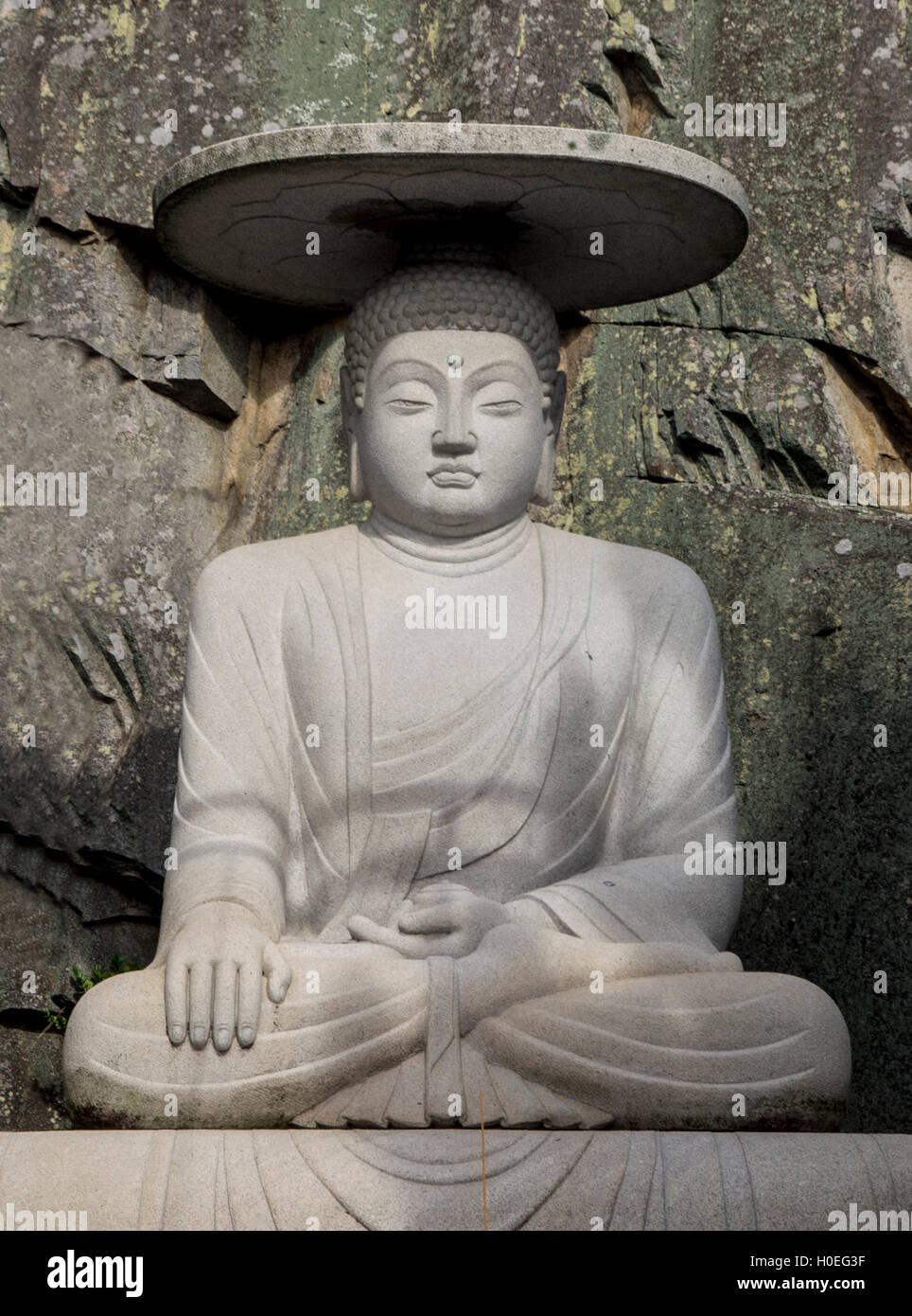 Stein Buddha Haedong Yonggunsa Tempel, Südkorea Stockfoto