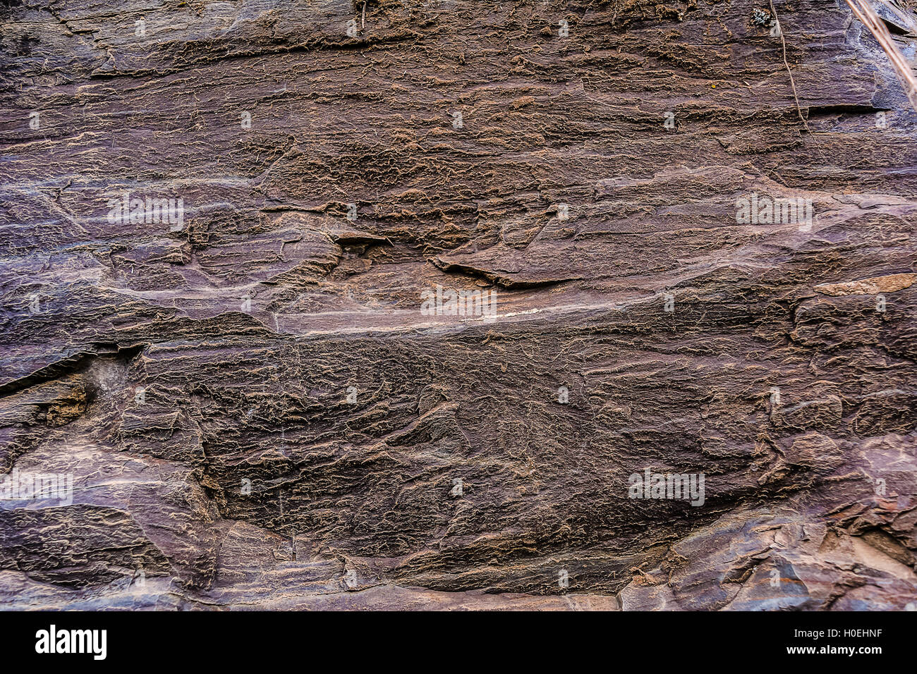 Braun verwitterte Felsen Hintergrund. Stein Oberfläche Hintergrund. Alte Stein Textur. Stein Textur. Stockfoto