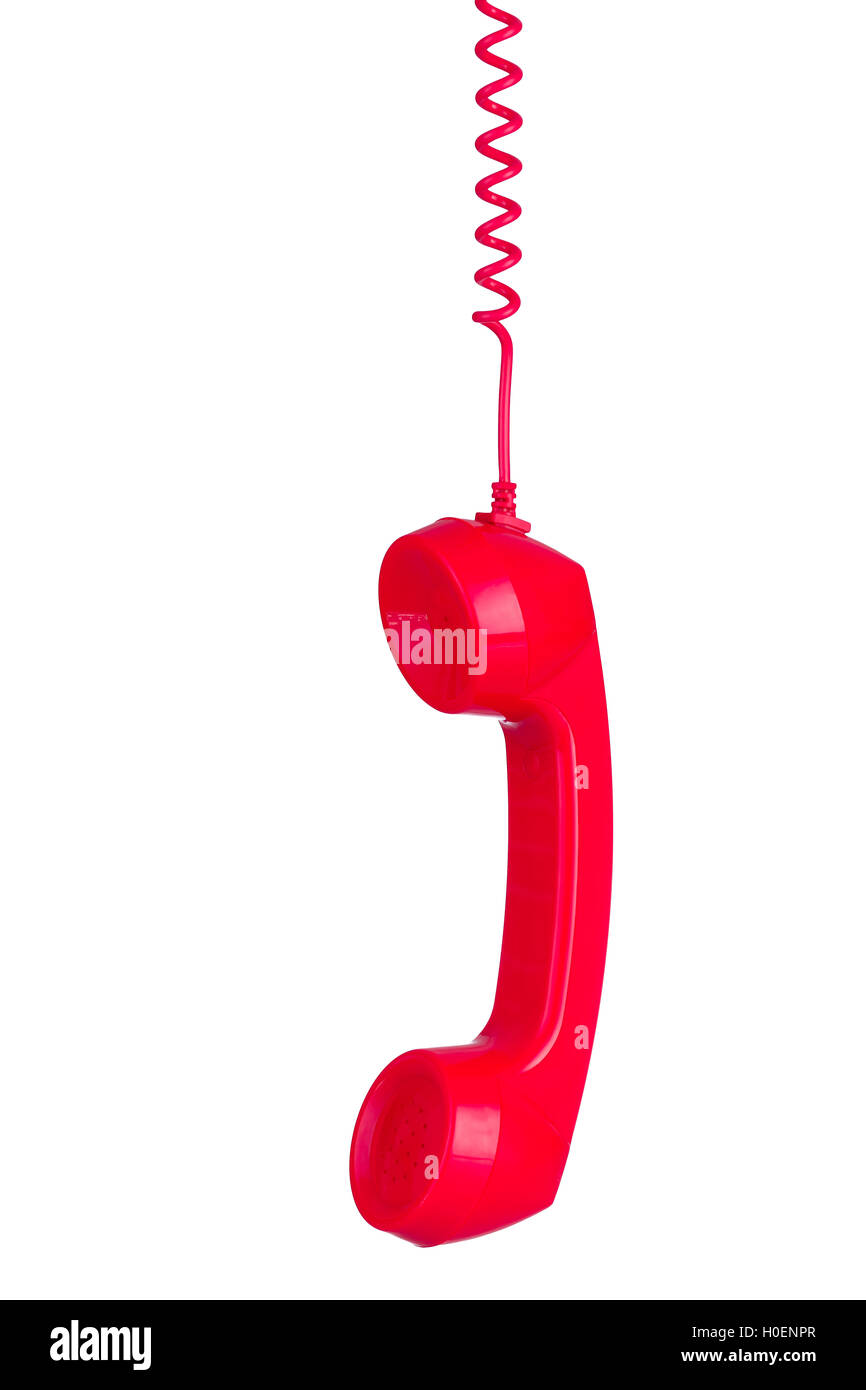 Rote Telefon Kopfhörer hängt von seinen Draht isoliert auf weißem Hintergrund Stockfoto