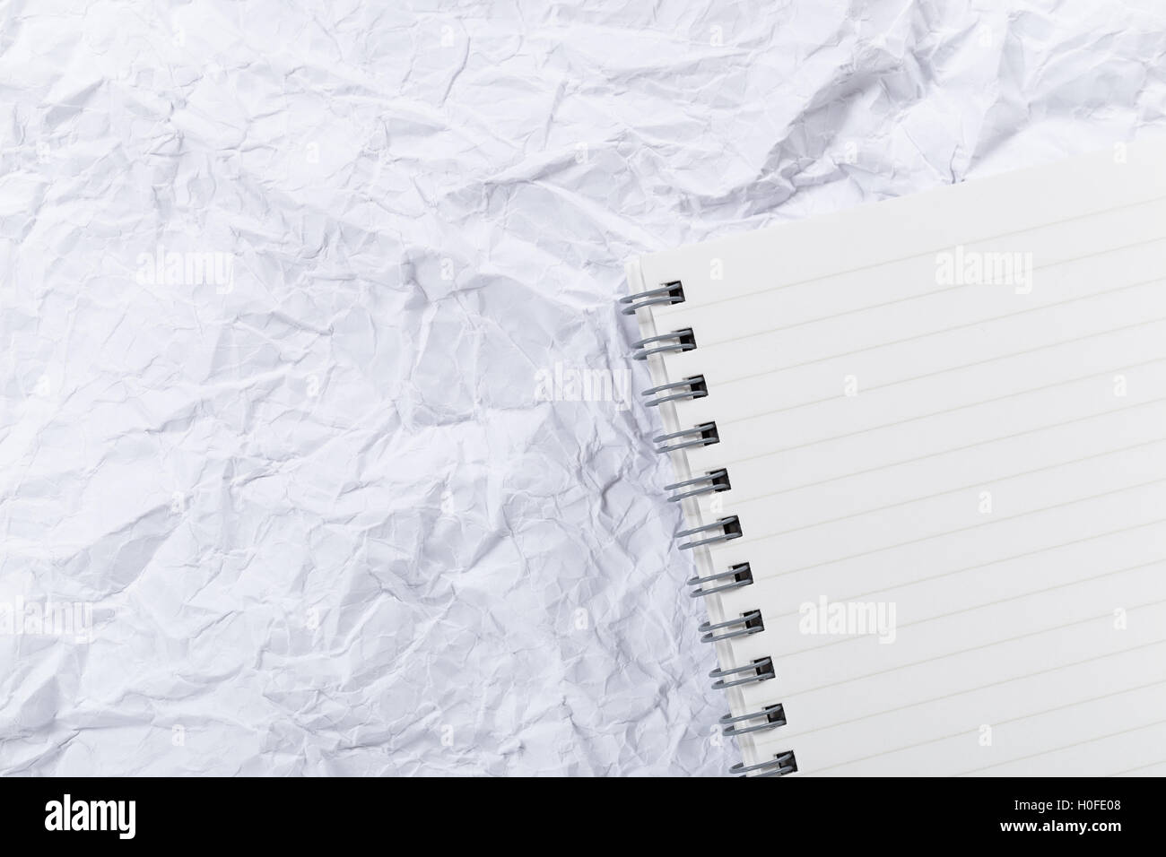 Weiße knüllen Papier und Notizblock Stockfoto