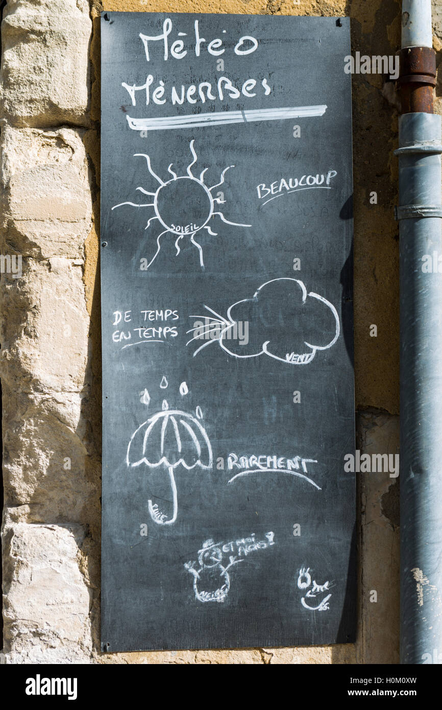 Humorvolle meteorologischen Tafel, Dorf von Menerbes, Luberon, Frankreich Stockfoto