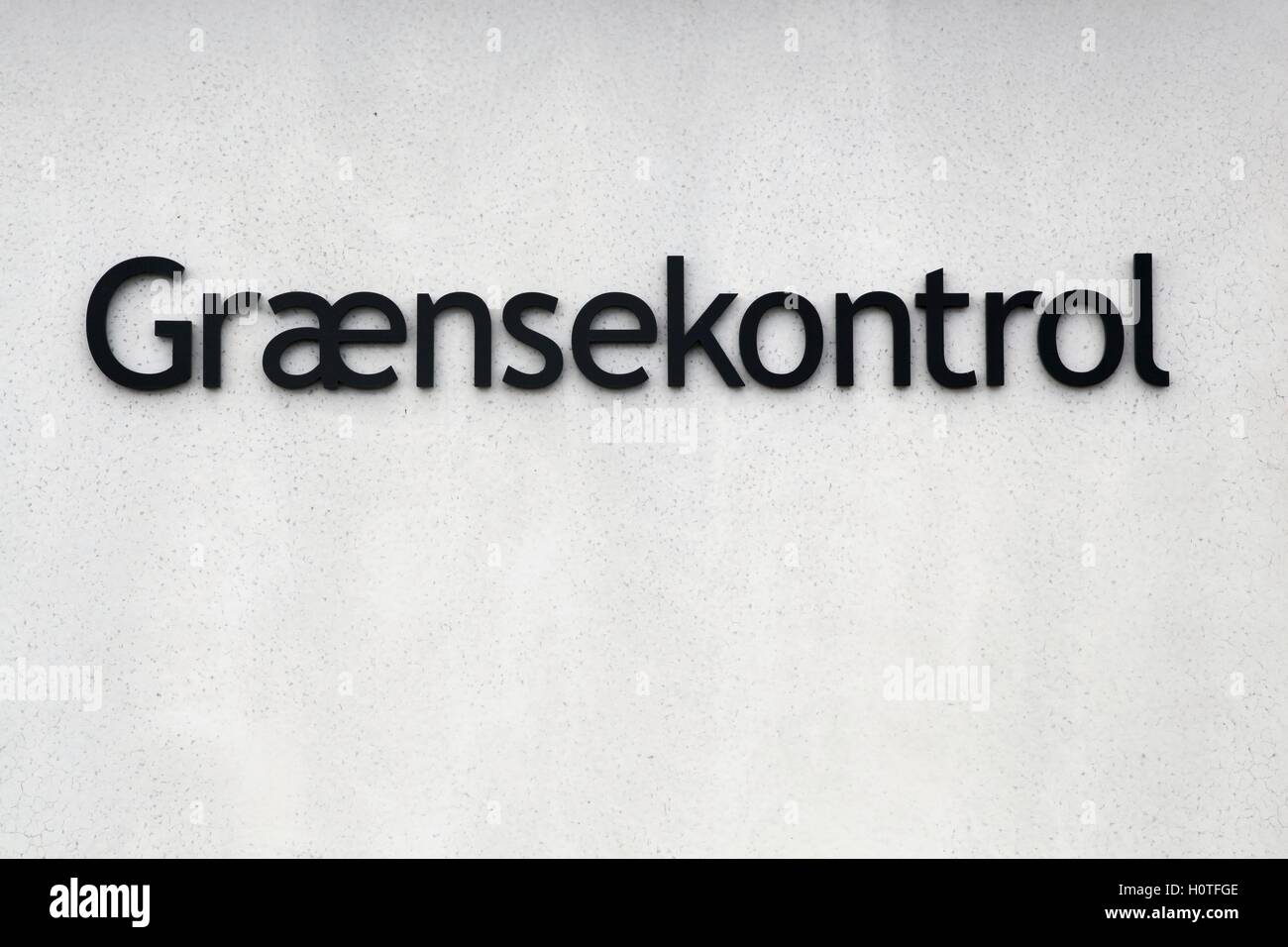 Grenze-Steuerzeichen an einer Wand in Dänemark Stockfoto