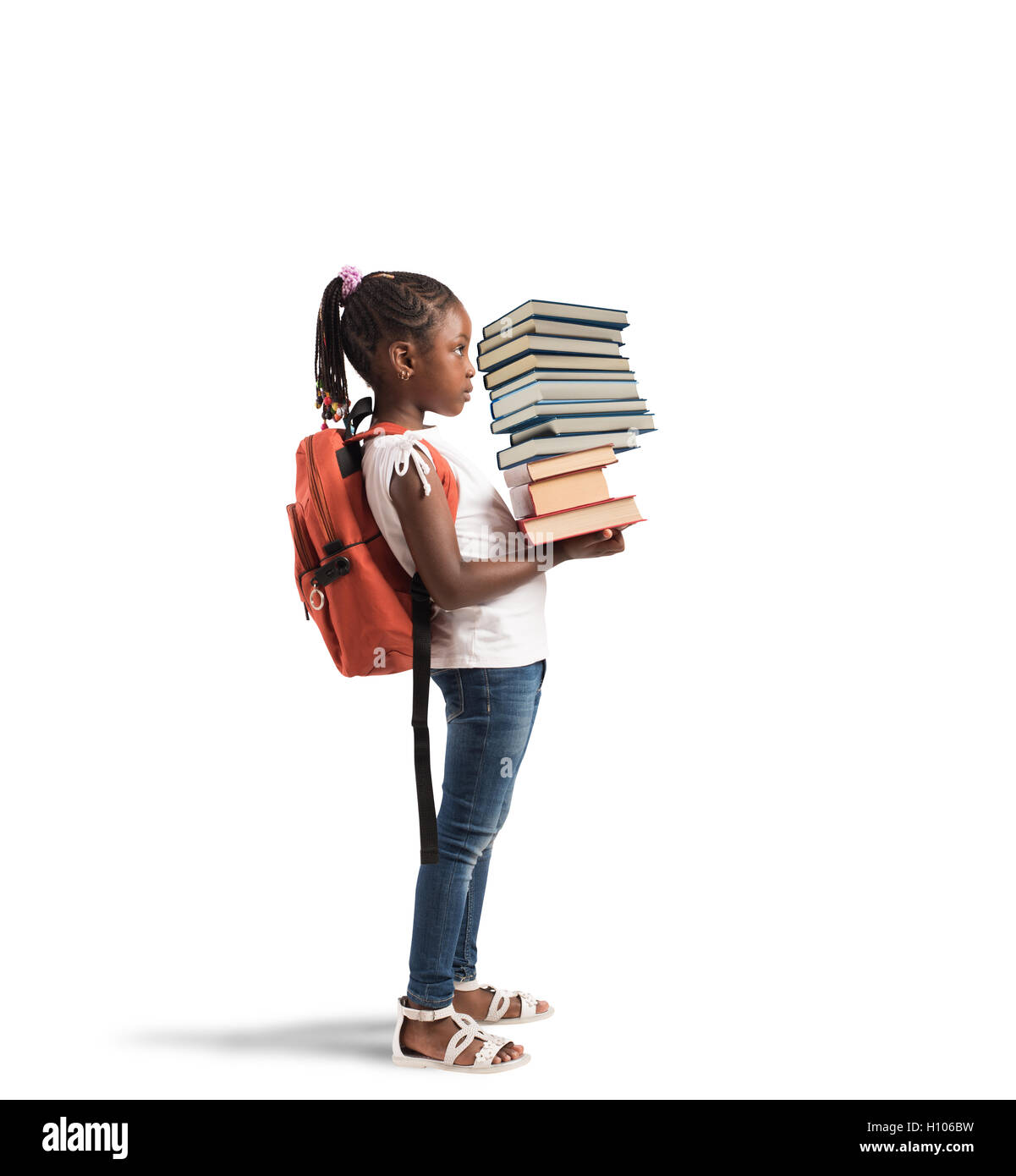 Stapel Bücher für ein kleines Mädchen Stockfoto