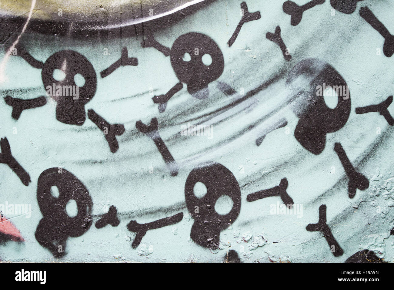 Graffiti-Schädel-städtischen Wand-Dekoration Stockfoto