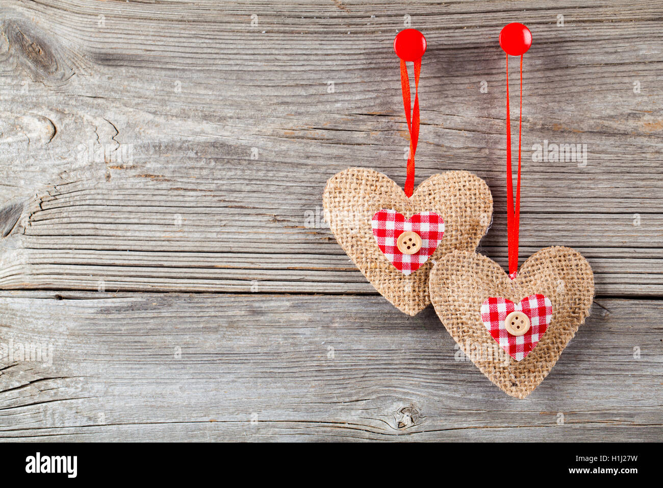 Herz aus Holz Hintergrund Stockfoto