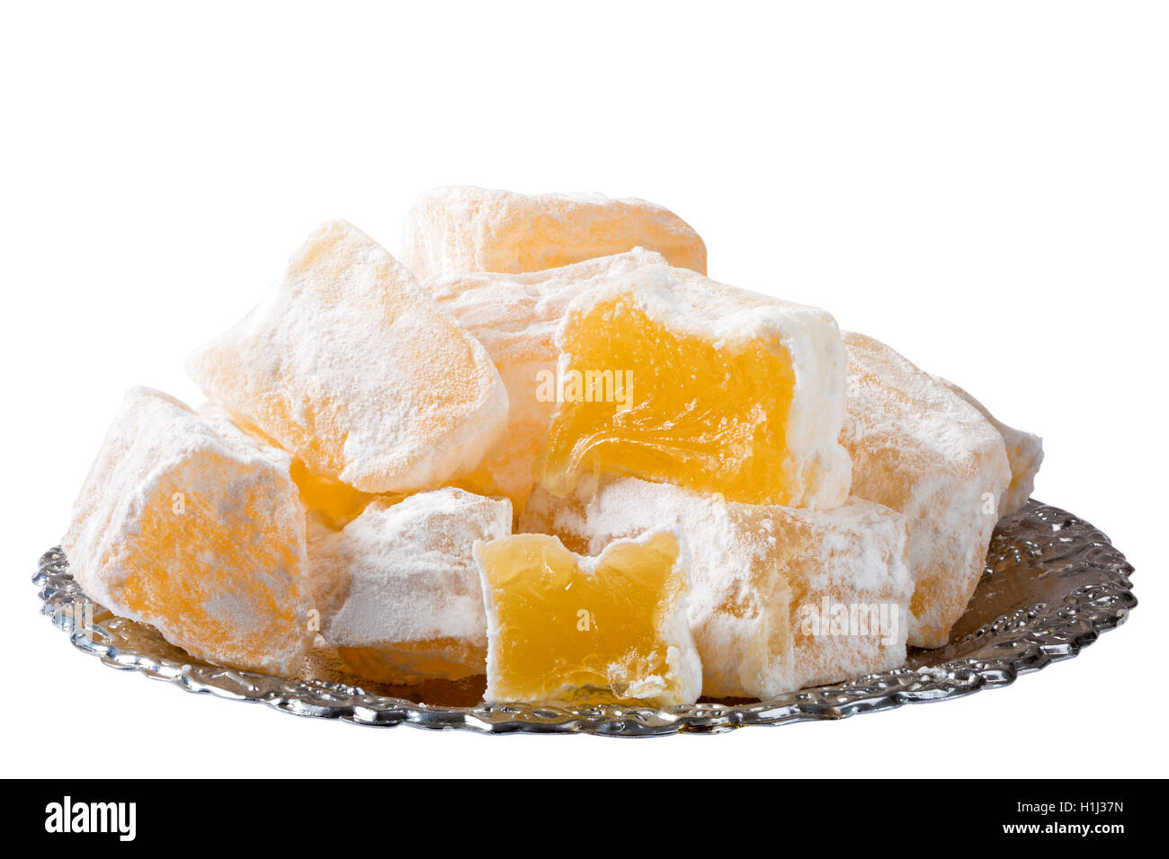 Türkische süße Freude Lokum traditionelles Dessert auf türkische Teller isoliert auf weiss mit Beschneidungspfad enthalten Stockfoto