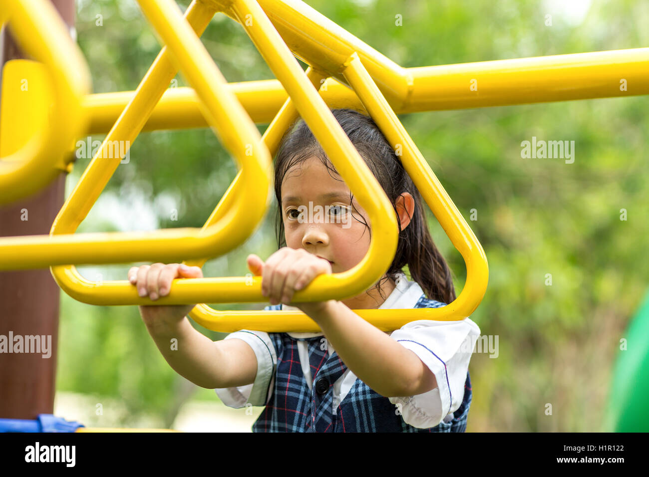 Konzept der Bestimmung von Kind auf Spielplatz illustriert. Stockfoto