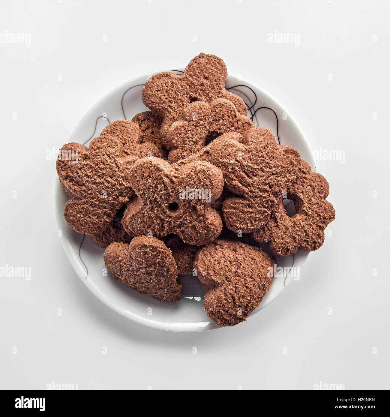 Schokoladen-Plätzchen auf Teller Stockfoto
