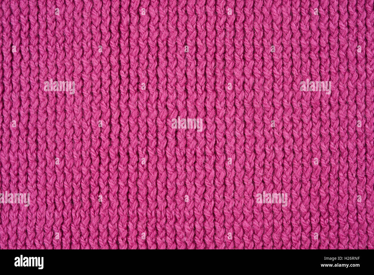 Rosa Strickmuster als nahtlose Hintergrund Stockfoto