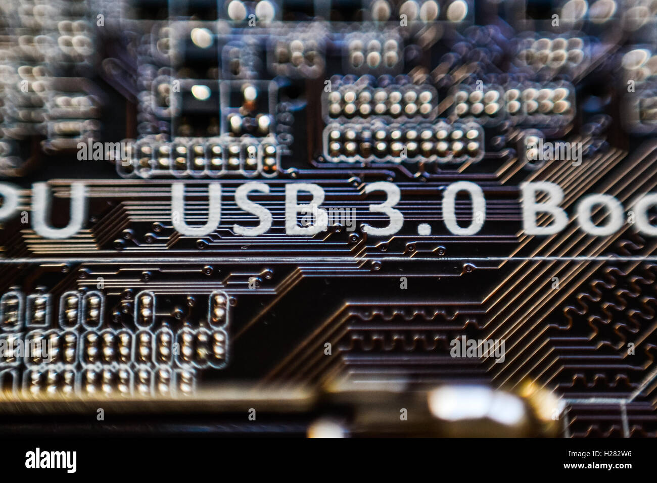 USB-3.0-Inschrift auf Motherboard-Mikro-Chip-Schaltung Stockfoto