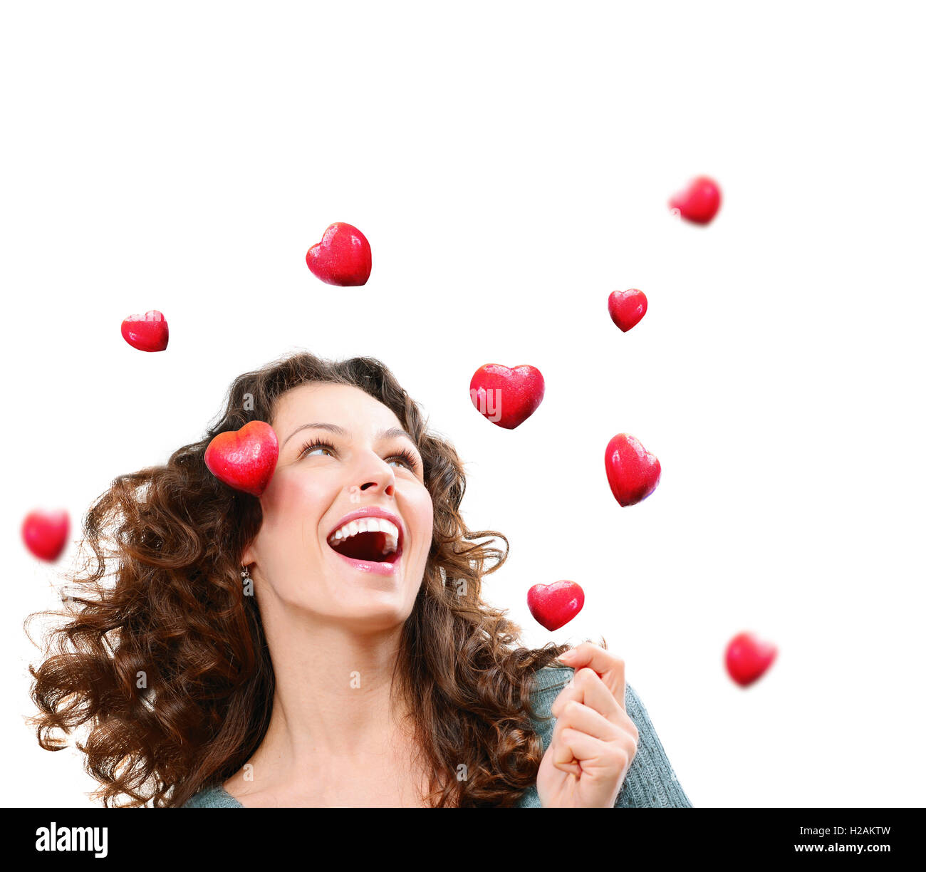 Schönheit junge Frau Valentine Herzen zu fangen. Liebe-Konzept Stockfoto