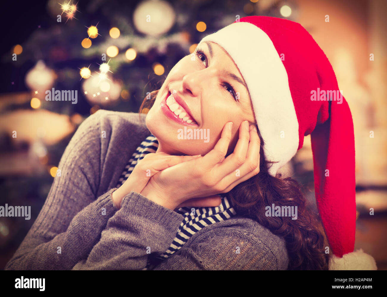 Weihnachten-Frau in Nikolausmütze Stockfoto