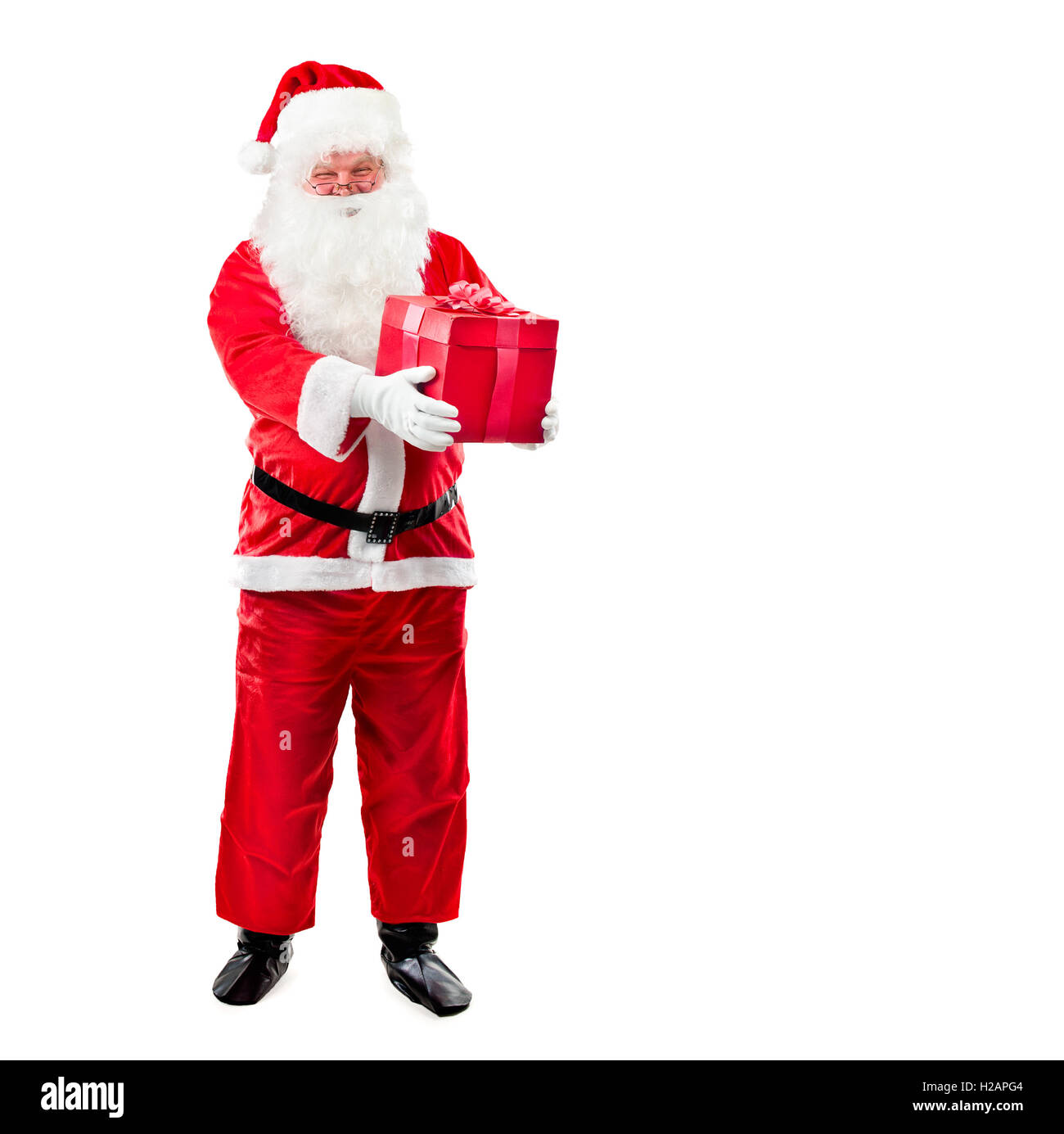 Santa Claus mit Weihnachts-Geschenk-Box isoliert auf weißem Hintergrund Stockfoto