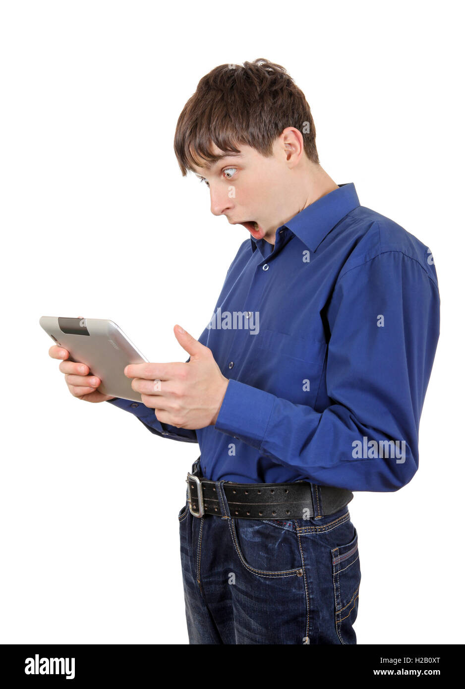 Junger Mann mit Tablet-PC Stockfoto