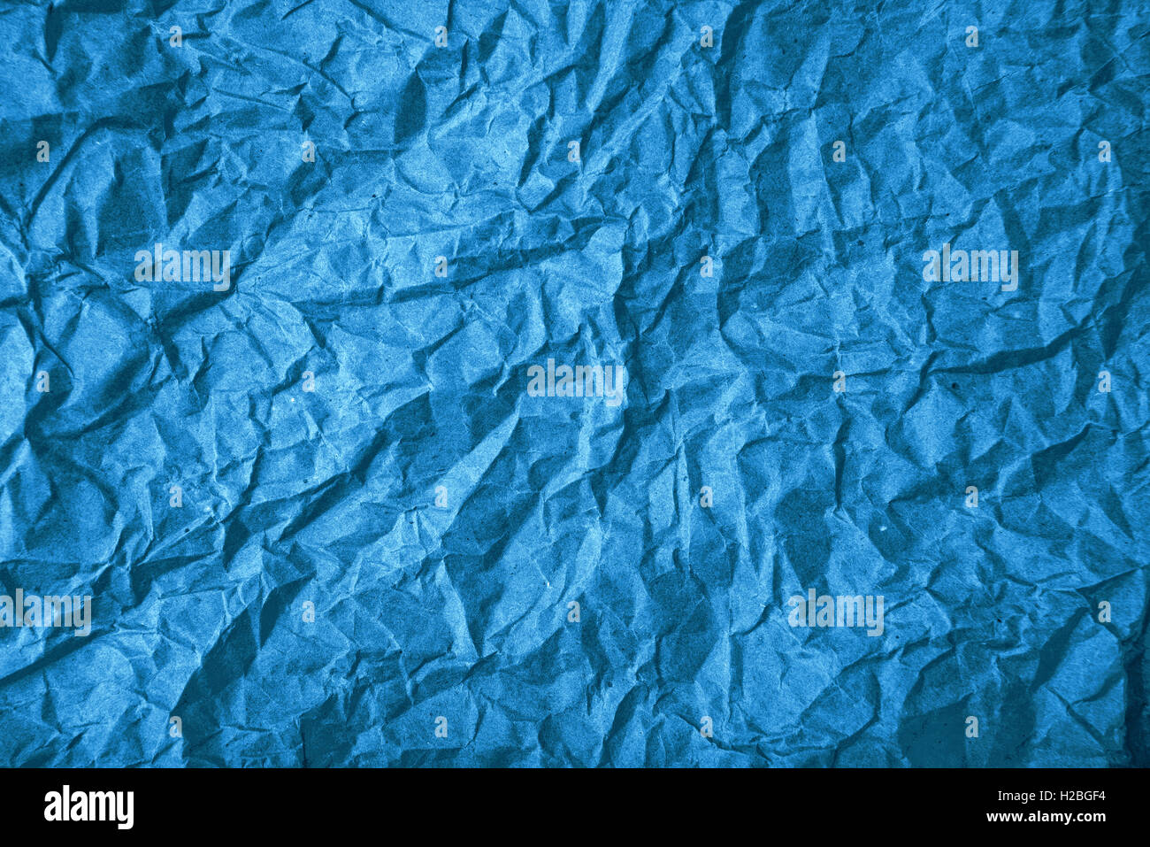 Grobe blaue zerknittertes Papier Textur als Hintergrund für Grafik-design Stockfoto