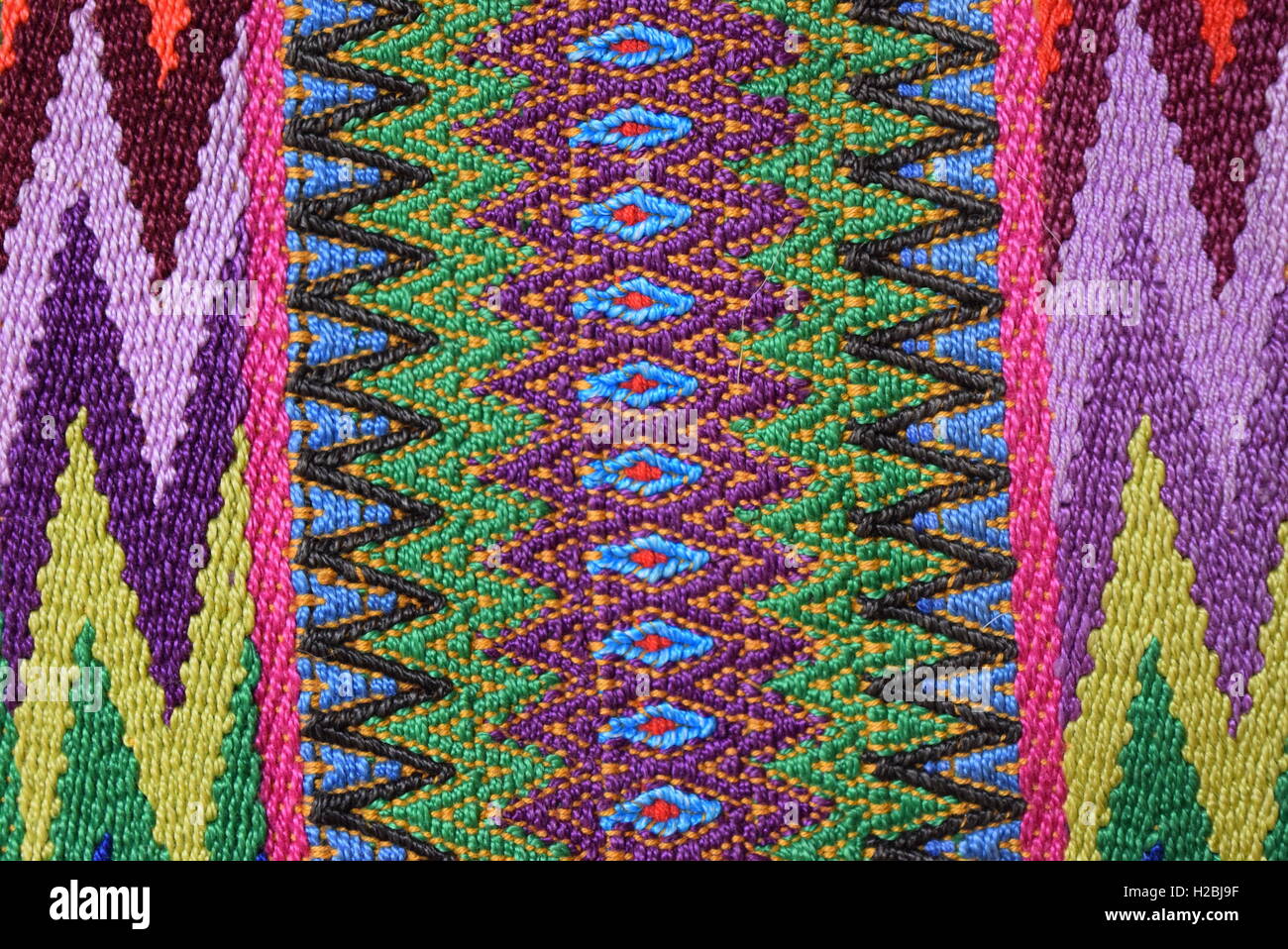 Textur: südamerikanische handgemachte bunten Stoff mit traditionellen Mustern der Streifen & Design, Antigua, Guatemala. Stockfoto