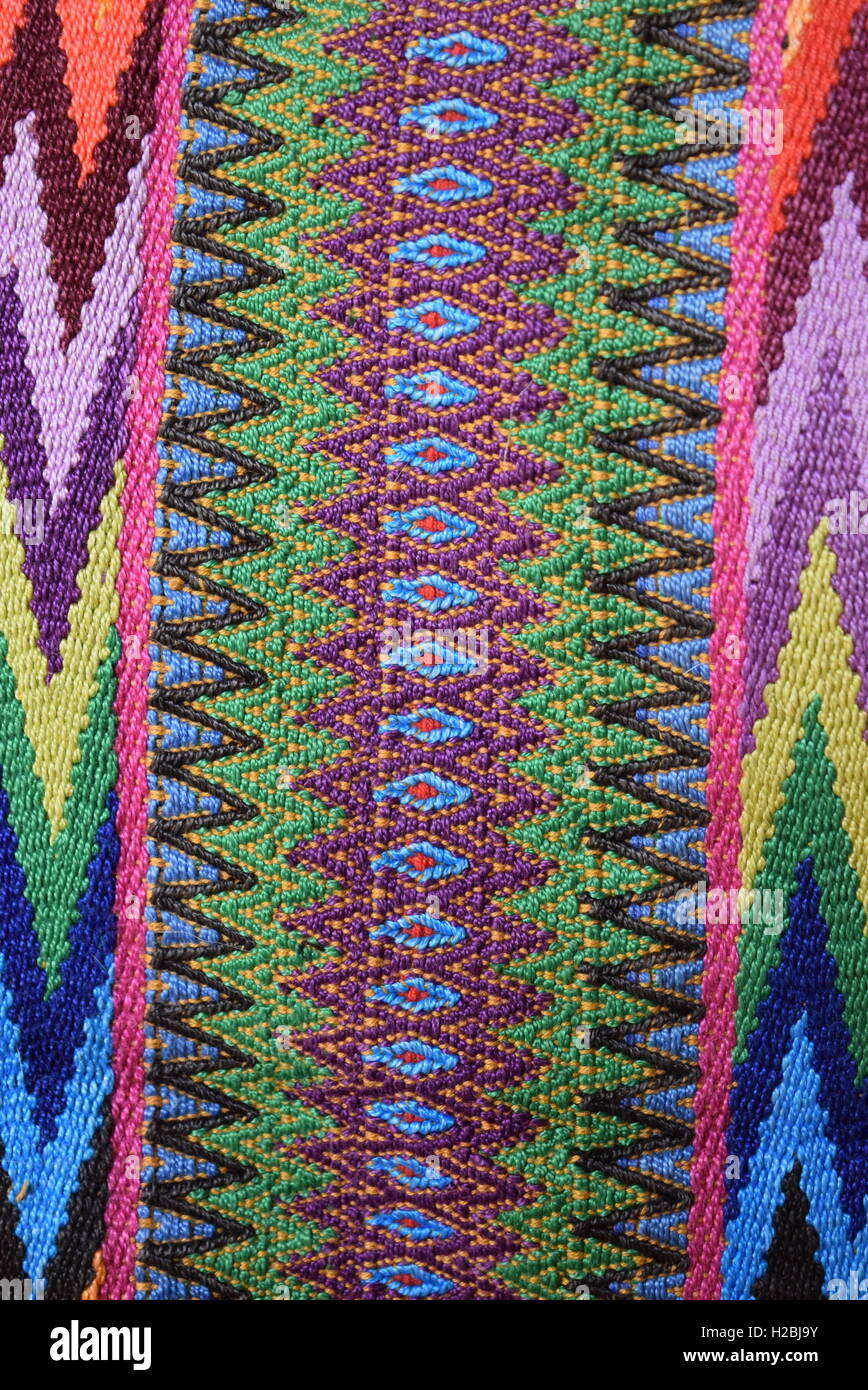Textur: südamerikanische handgemachte bunten Stoff mit traditionellen Mustern der Streifen & Design, Antigua, Guatemala. Stockfoto