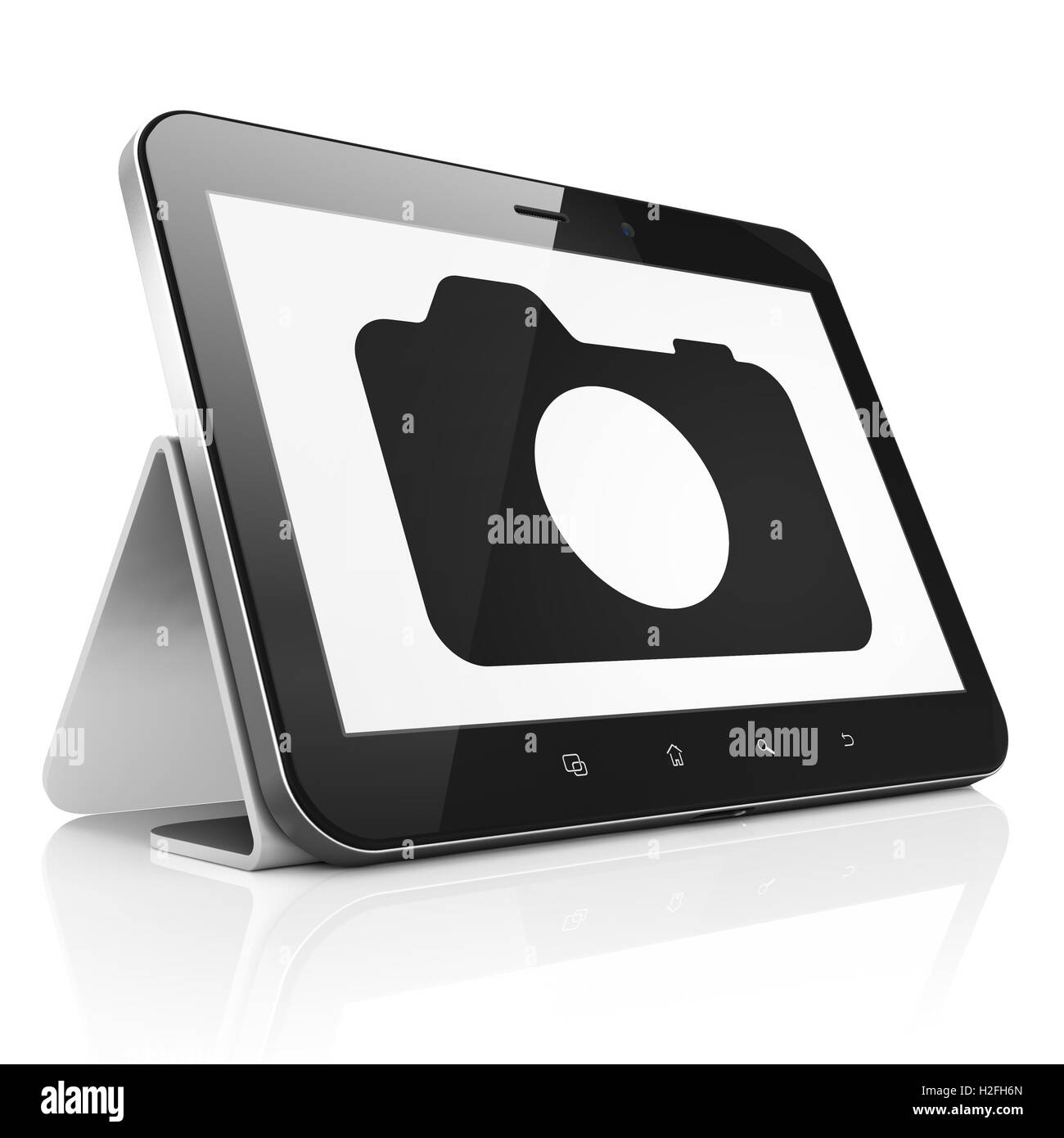 Urlaub-Konzept: Fotokamera auf Tablet PC Stockfoto
