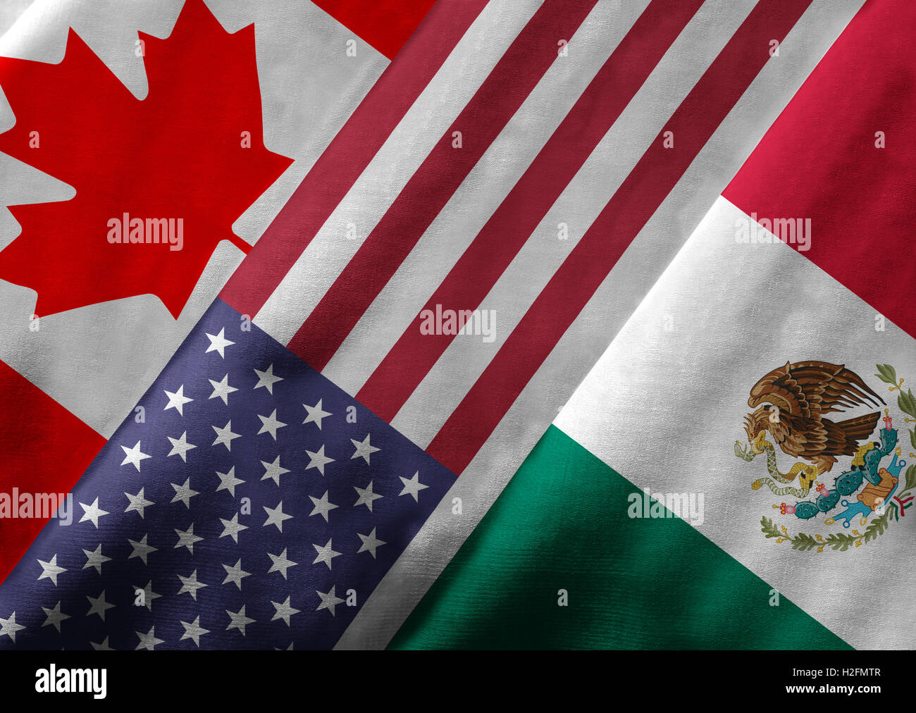 Nahaufnahme der Flaggen der nordamerikanischen Freihandelsabkommen NAFTA-Mitglieder auf Textile Textur. Stockfoto