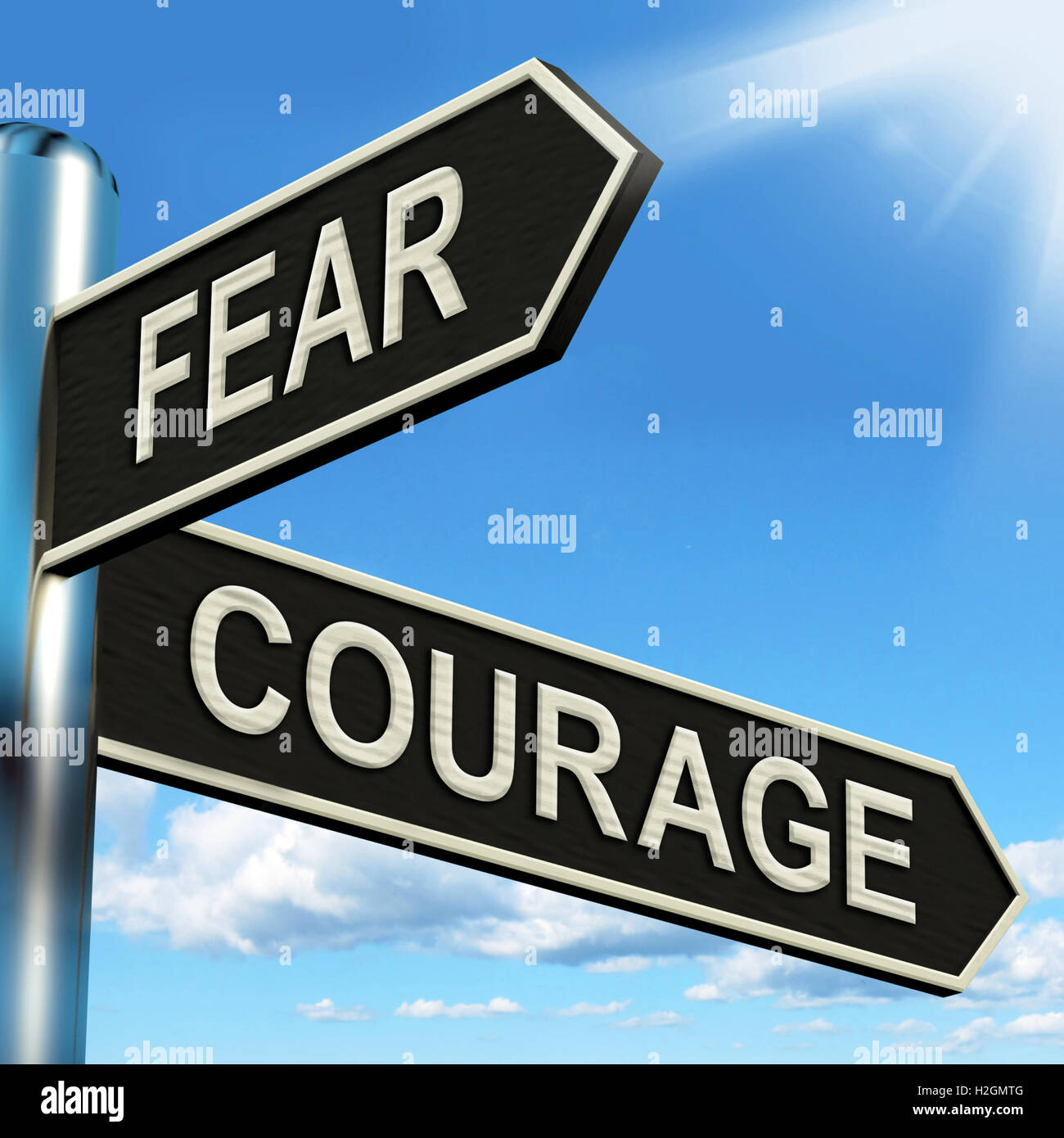 Angst-Mut-Wegweiser zeigt, ängstlich oder mutig Stockfoto