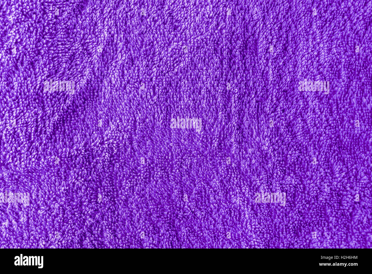 Textur der lila Bade-Handtuch als Hintergrund Stockfoto