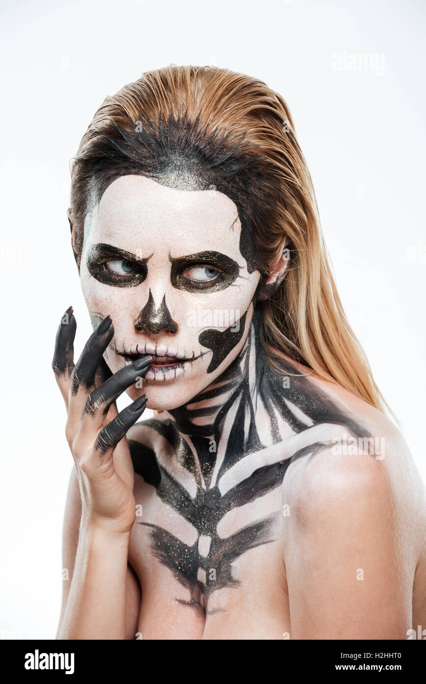 Porträt der Frau mit erschreckenden Angst Make-up auf weißem Hintergrund Stockfoto