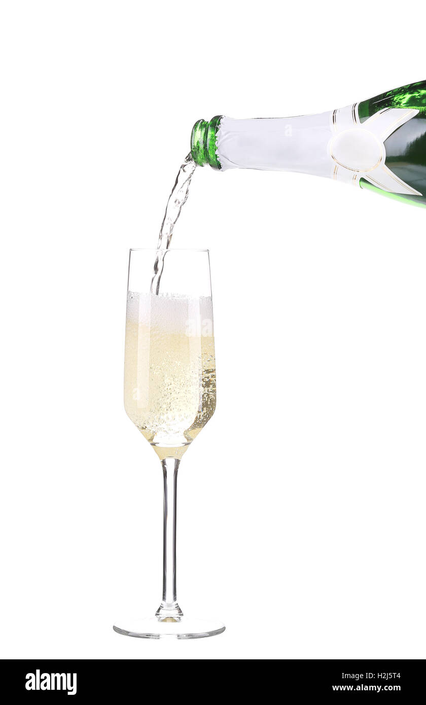 Champagner in ein Glas gießen. Stockfoto