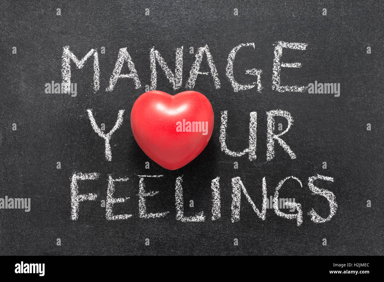 Verwalten Sie Ihren Gefühlen Ausdruck handschriftlich auf Tafel mit Herzsymbol statt O Stockfoto