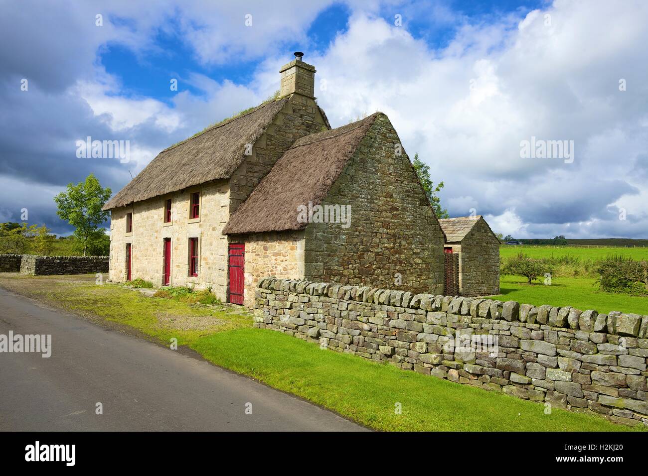 Damm-Haus. Bauernhaus aus dem 18. Jahrhundert, strohgedeckten Heidekraut bekannt als schwarze Thack. Vindolanda, Bardon Mühle, Northumberland, UK Stockfoto