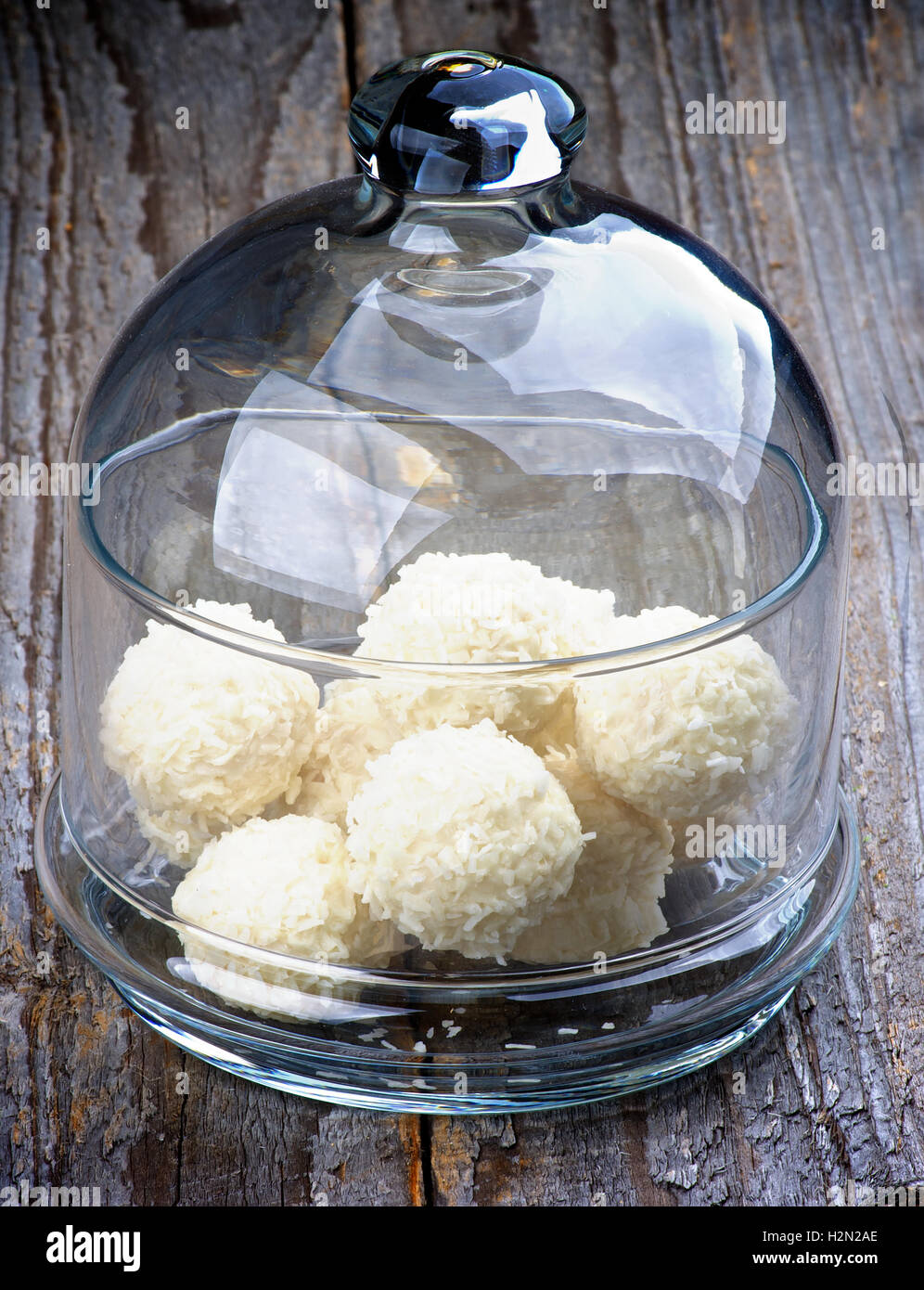 Glas mit Kokosnuss-Bonbons Stockfoto