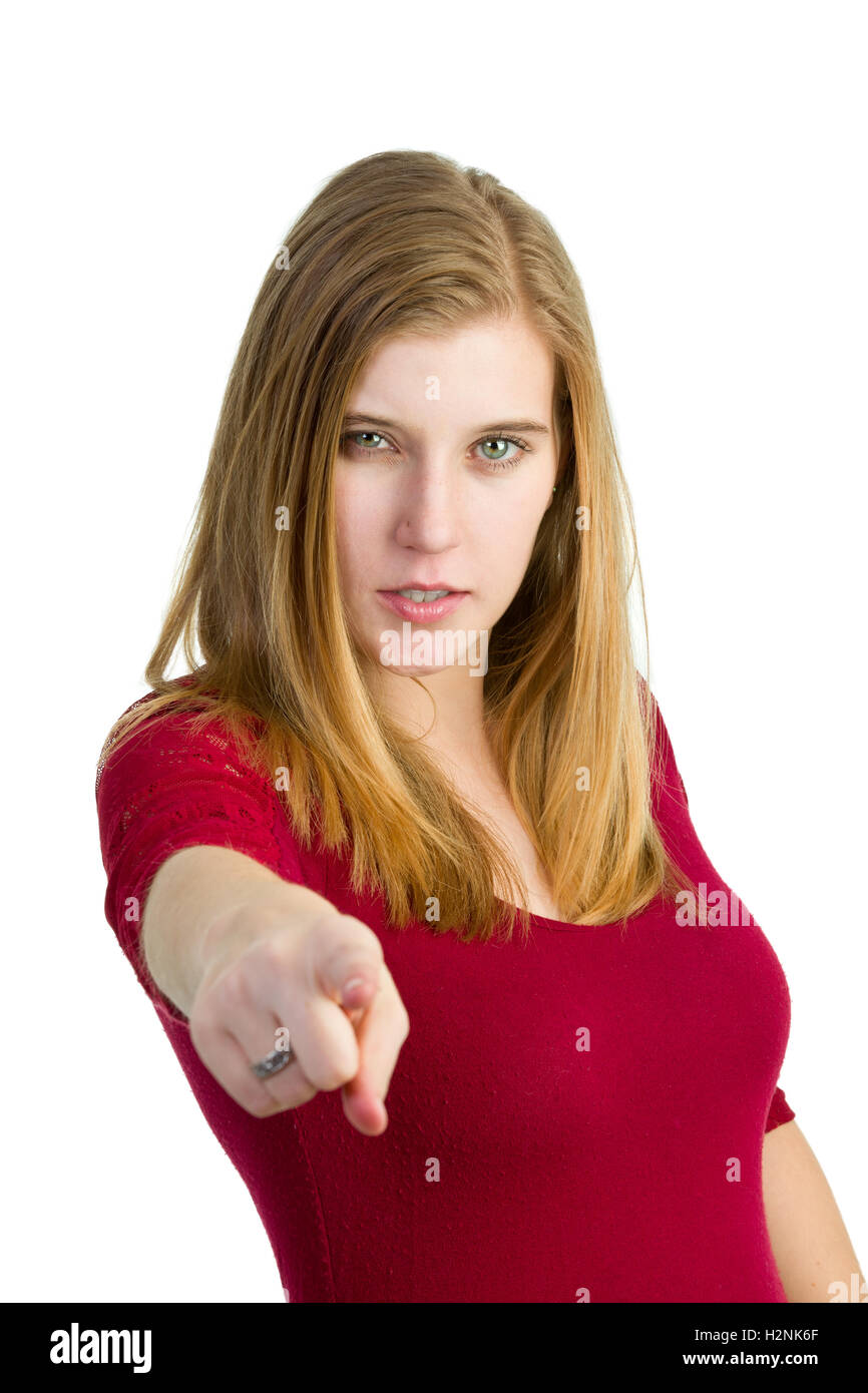 Eine attraktive aber ernste Frau mit ihrem Finger auf die Kamera Stockfoto