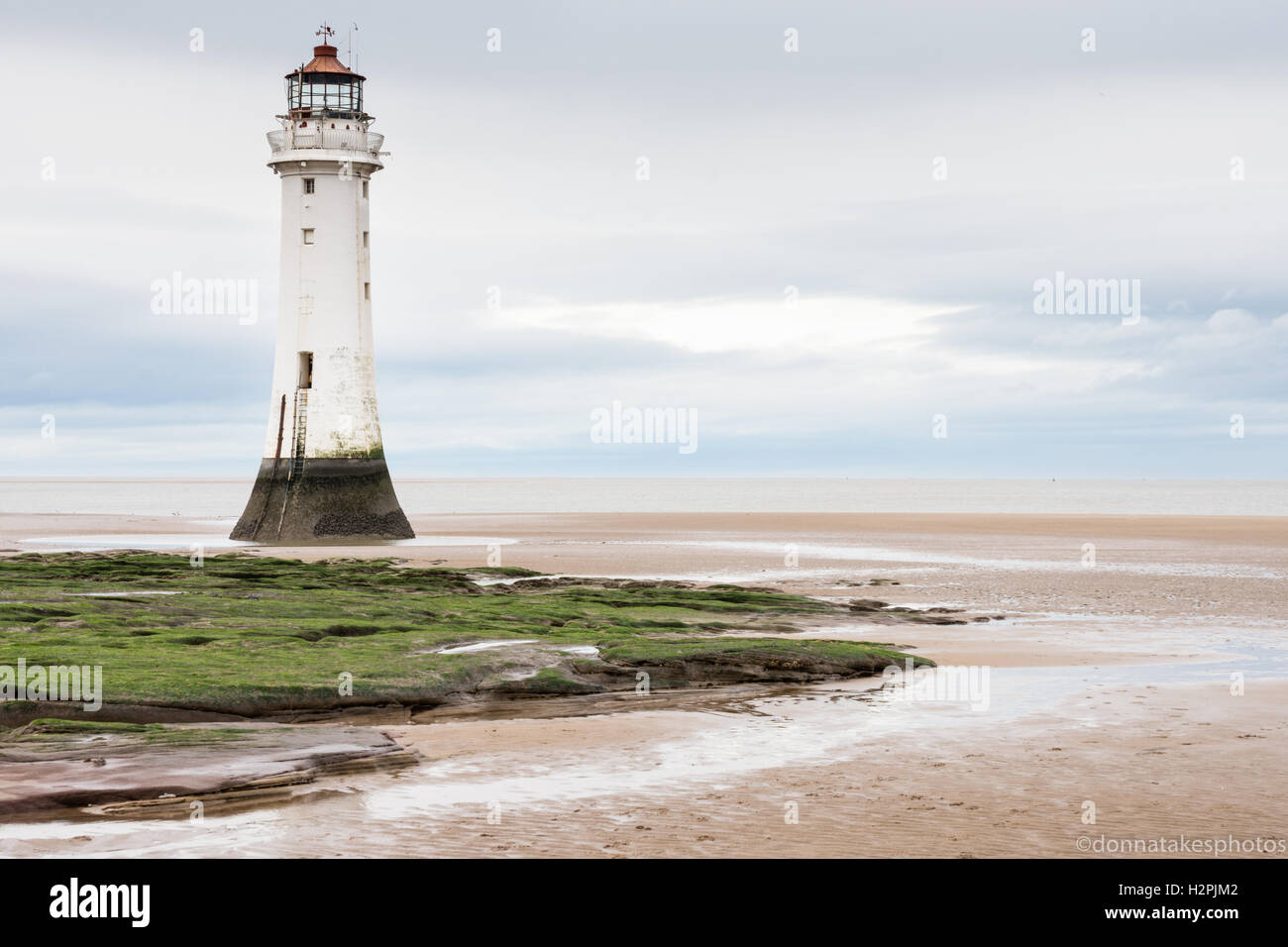 Der New Brighton Lighthouse oder der Perch Rock Lighthouse ist ein stillgelegter Leuchtturm im Wirral in England Stockfoto