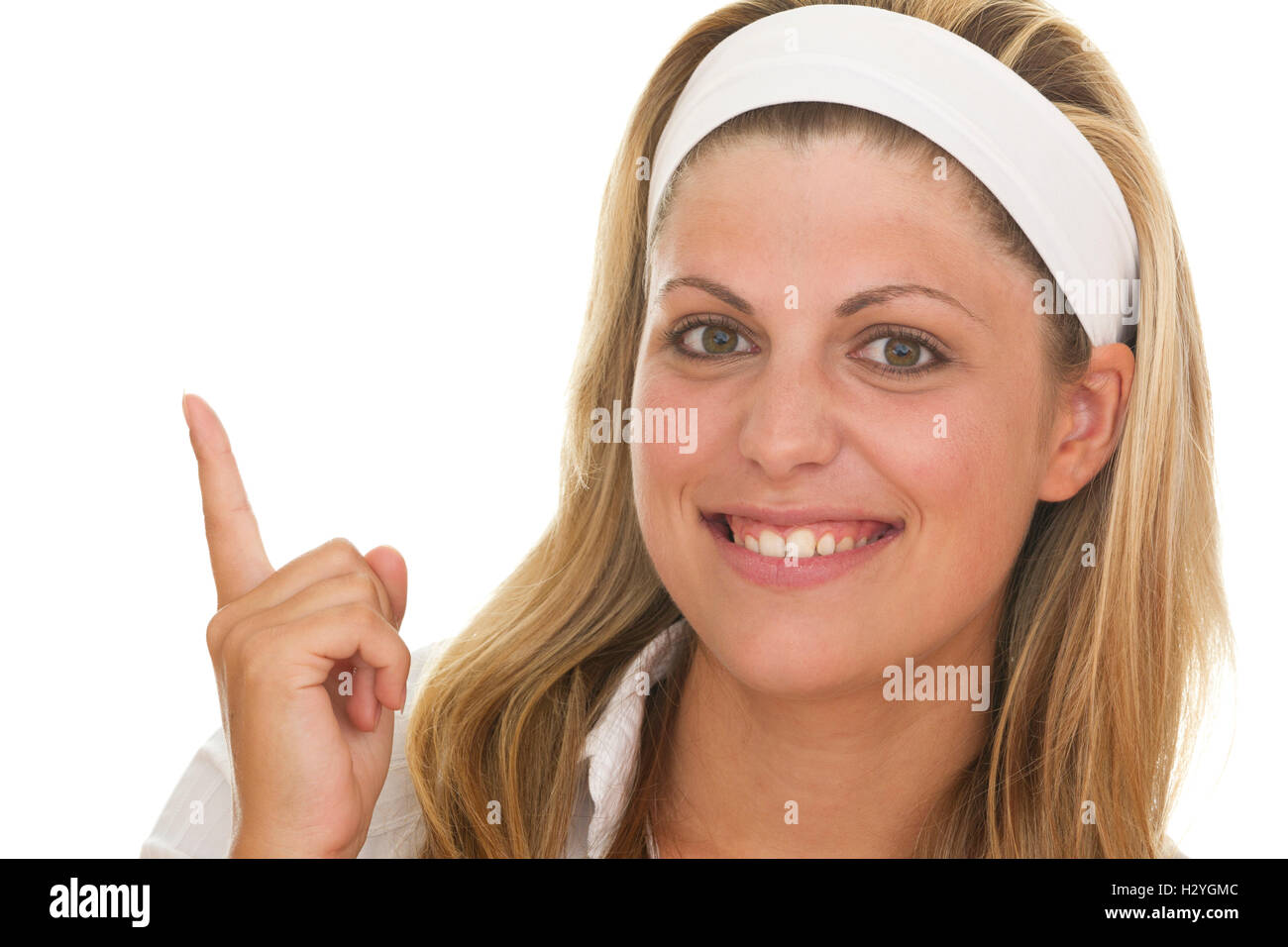 Junge Frau mit einem erhobenen Zeigefinger Stockfoto