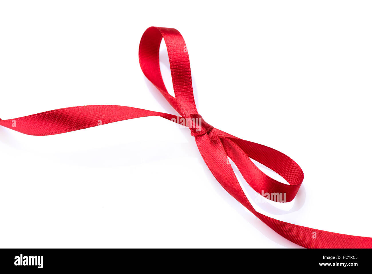 Rote satin Geschenk Bogen. Rotes Seidenband Stockfoto