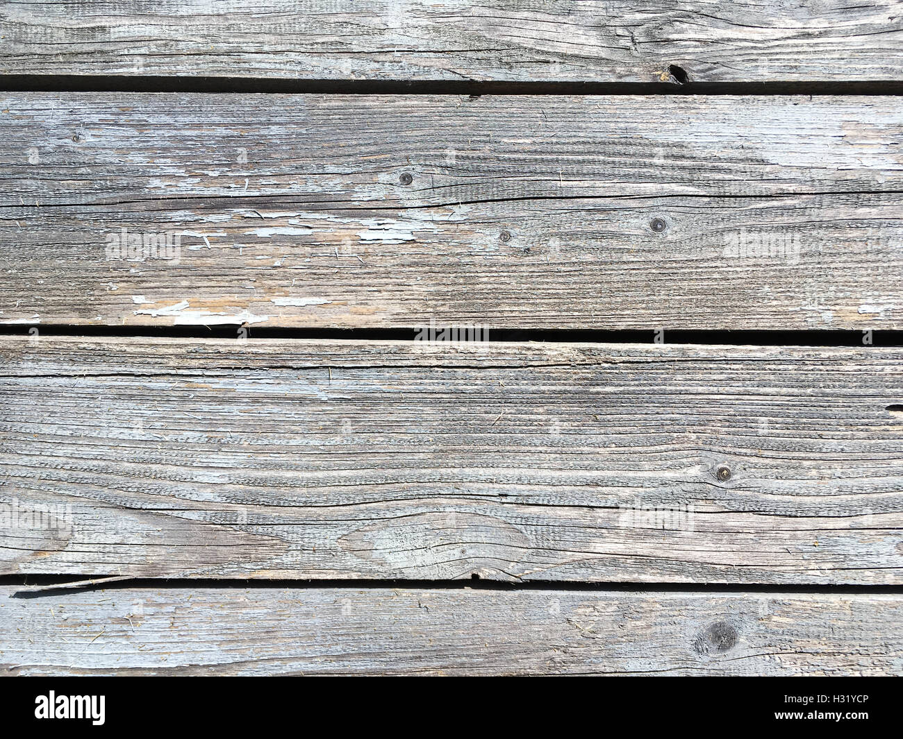 alten Grunge Holzbohlen mit abgeplatzte Farbe strukturierten Hintergrund Stockfoto