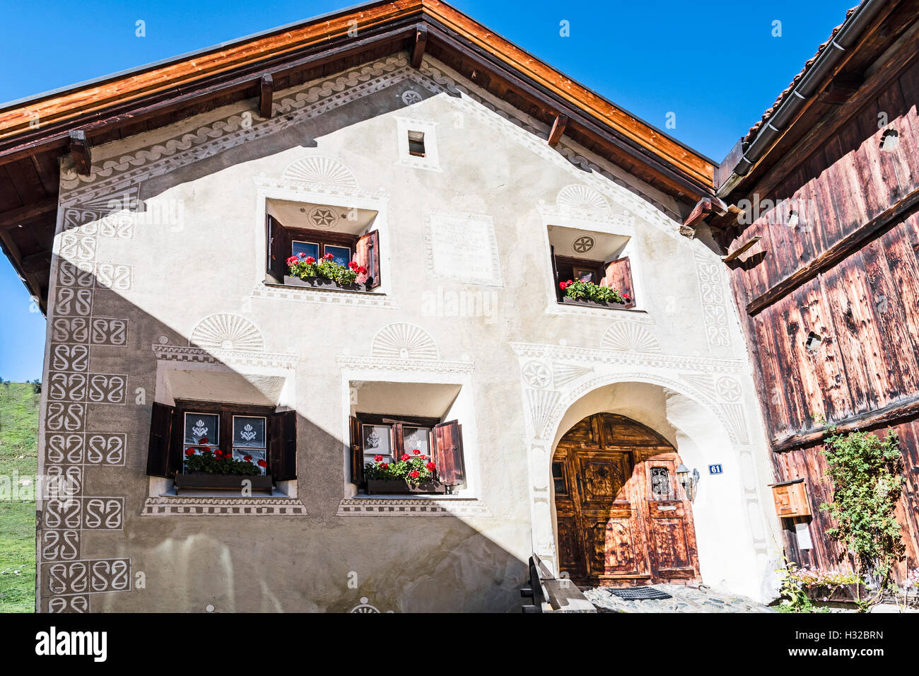 Häuser in Guarda, Symbole, Engadin, Schweiz Stockfoto