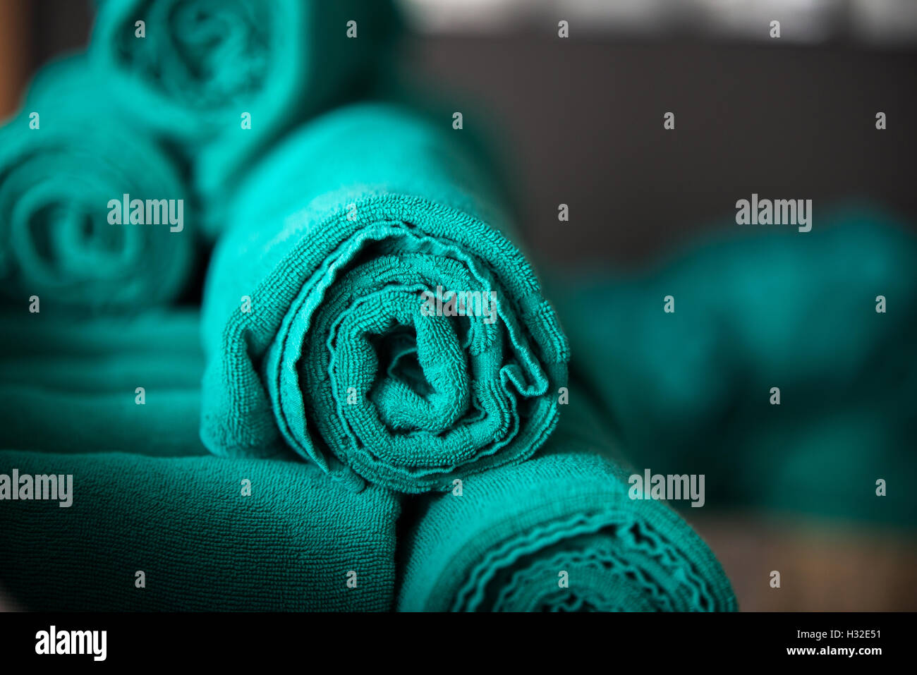 Roll-Grün der Badetuch Stockfoto